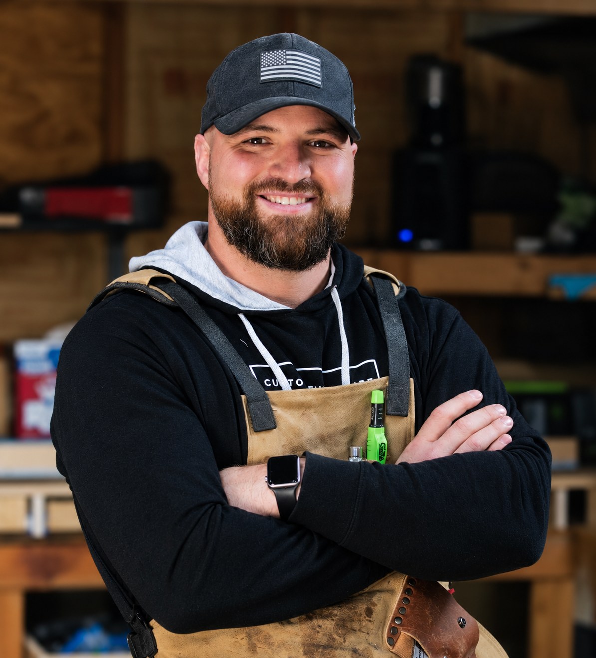 Travis, founder of Joinery, in his furniture shop